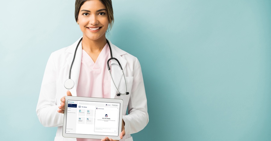 Nurse holding a tablet with Cloda interface.